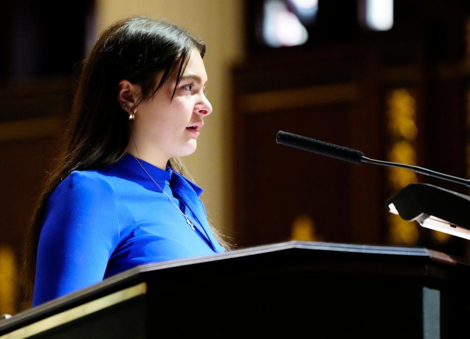 Laeticia de Cavel, daughter of Jean-Robert de Cavel, talks about her dad during his funeral at The Cathedral Basilica of Saint Peter in Chains in downtown Cincinnati Monday, Jan. 16, 2023.