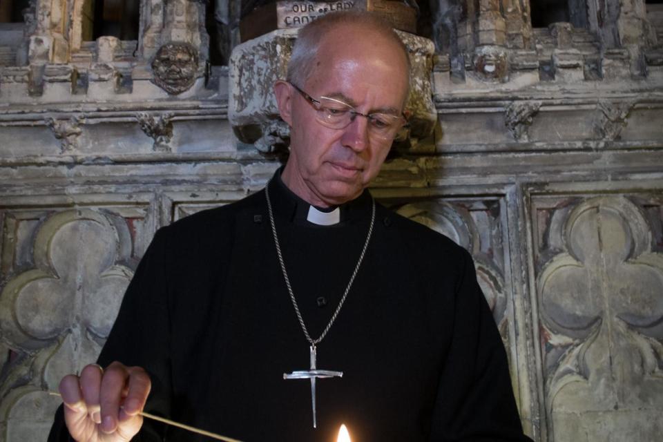 The Archbishop of Canterbury, the Rev Justin Welby lit a candle at Canterbury Cathedral (PA)