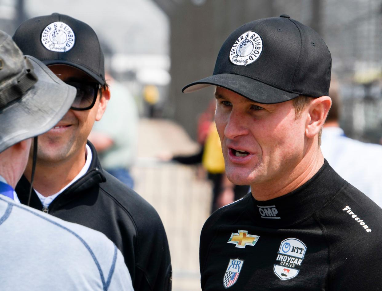 Dreyer & Reinbold Racing driver Ryan Hunter-Reay (23) talks near pit lane Thursday, May 18, 2023, during the third day of practice for the 107th running of the Indianapolis 500 at Indianapolis Motor Speedway. 