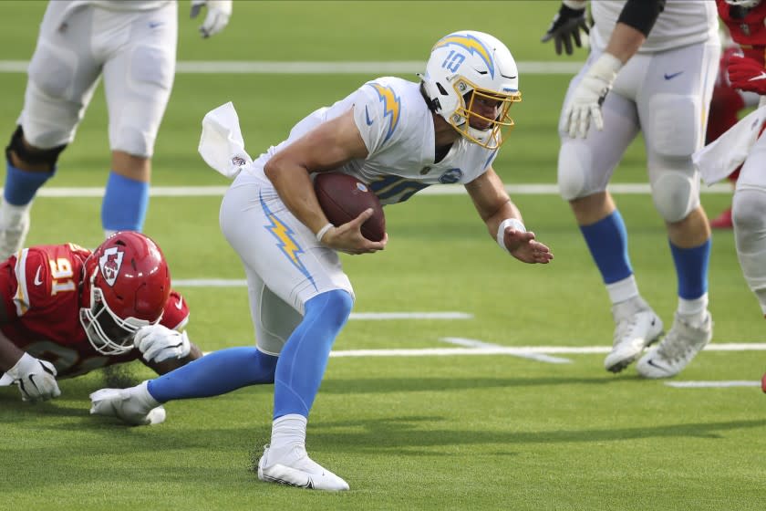 Los Angeles Chargers quarterback Justin Herbert (10) rushes during an NFL football game between the between the Kansas City Chiefs and the Los Angeles Chargers, Sunday, Sept. 20, 2020, in Inglewood, Calif. (AP Photo/Peter Joneleit)