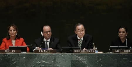 Ban Ki-moon (2nd from R), Secretary-General of the United Nations, delivers his opening remarks at the Paris Agreement signing ceremony on climate change as French President Francois Hollande (2nd from L) looks on at the United Nations Headquarters in Manhattan, New York, U.S., April 22, 2016. REUTERS/Mike Segar
