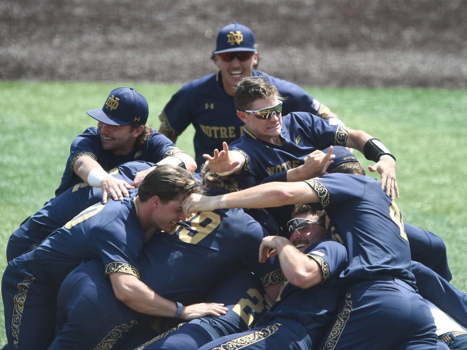 Notre Dame players celebrate their win over Tennessee in the Knoxville Super Regional championship game Sunday. The Fighting Irish will face Texas in the CWS on Friday night.