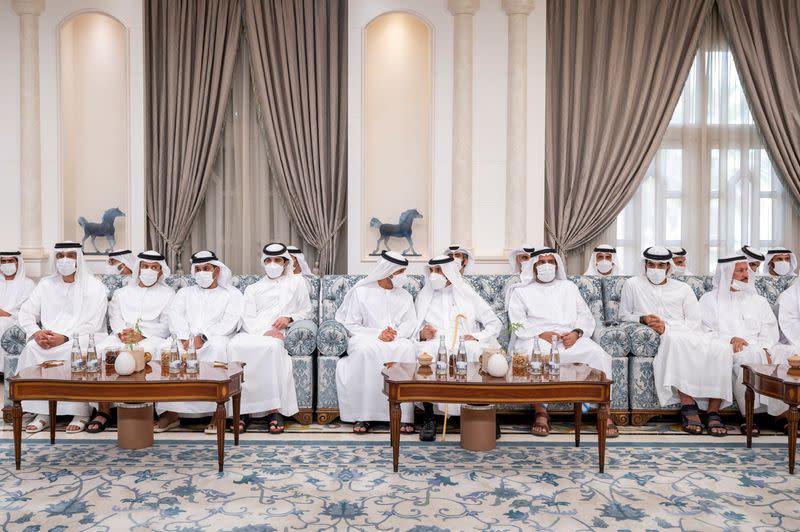 Members of the Royal family sit while receiving condolences after the death of late President of the United Arab Emirates Sheikh Khalifa bin Zayed Al Nahyan at Mushrif Palace in Abu Dhabi