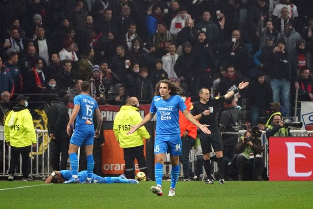 Dimitri Payet is hit by a bottle