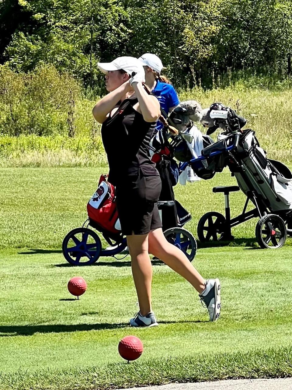 Pleasant's Maura Murphy hits a drive during the second Mid Ohio Athletic Conference Golf Tournament held Tuesday at Oakhaven.