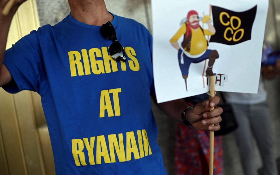 Protesters wear 'rights at Ryanair' T-shirts as they take part in the strike - Oscar Del Pozo/AFP via Getty Images