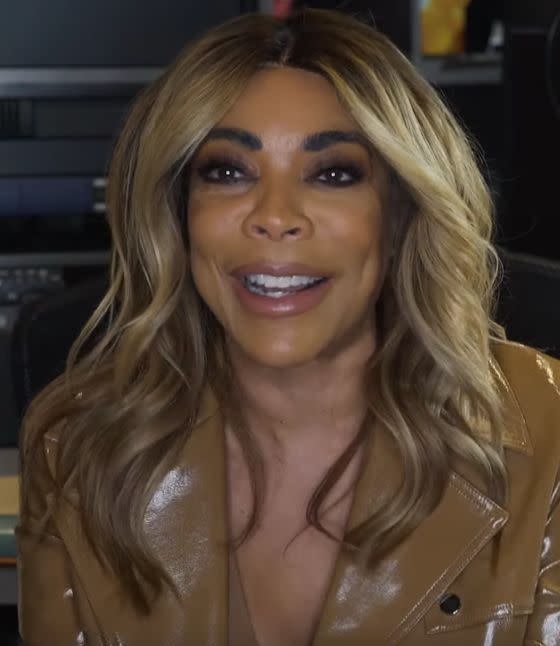 Wendy Williams has on a brown leather jacket with a brown inner wear and pants to match