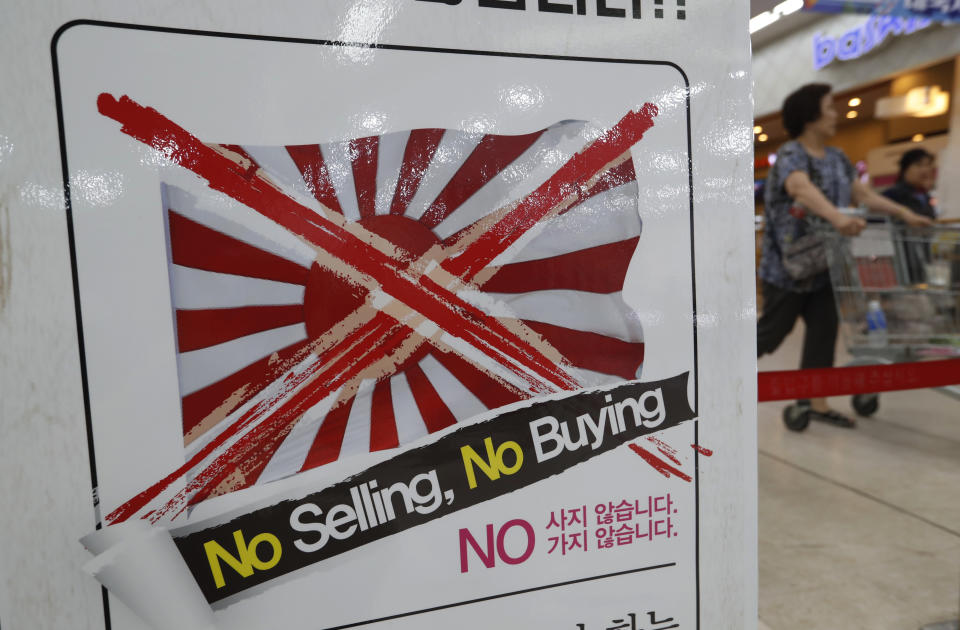 A notice campaigning for a boycott of Japanese-made products is displayed at a store in Seoul, South Korea, Friday, July 12, 2019. South Korea said Friday it wants an investigation by the United Nations or another international body as it continues to reject Japanese claims that Seoul could not be trusted to faithfully implement sanctions against North Korea. The signs read: "We don't sell Japanese products." (AP Photo/Ahn Young-joon)