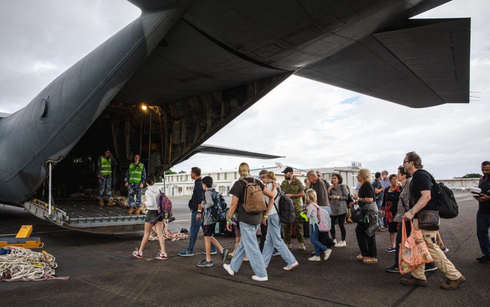 Australian Air Force transport aircraft has evacuated trapped tourists