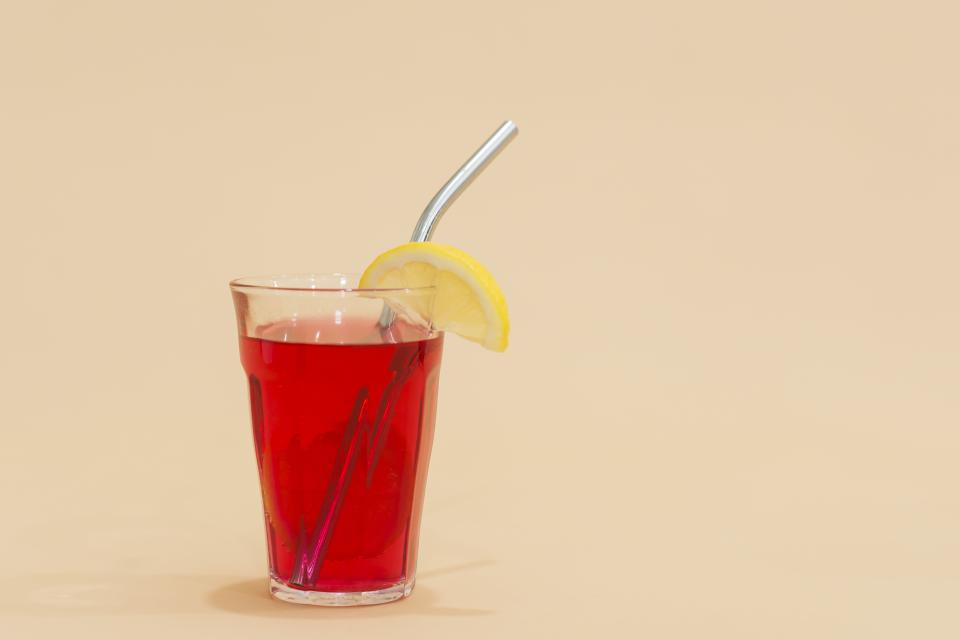 Cocktail on tan background.