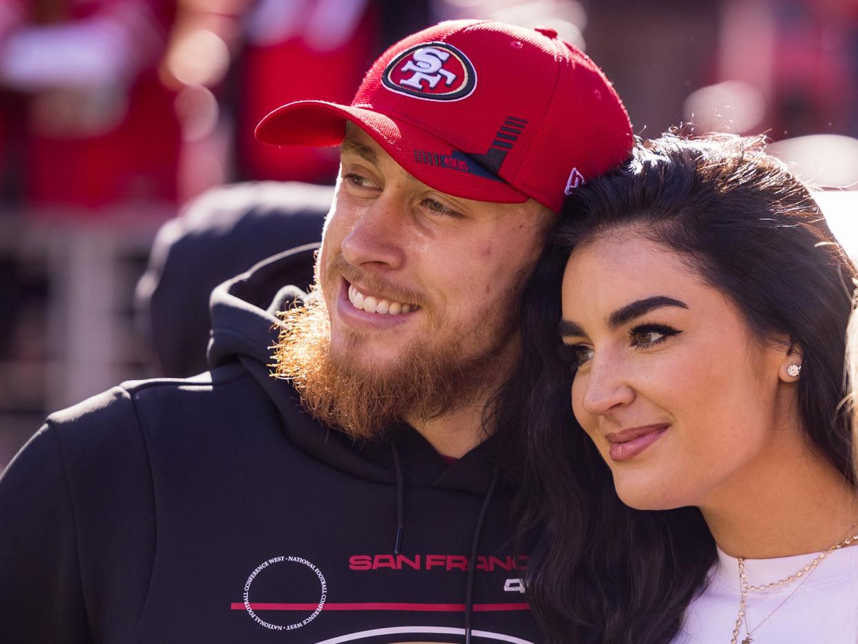 San Francisco 49ers Tight End George Kittle (85) poses with his wife, Claire, before the NFL pro football game between the Houston Texans and San Francisco 49ers on January 2, 2022 at Levis Stadium in Santa Clara, CA