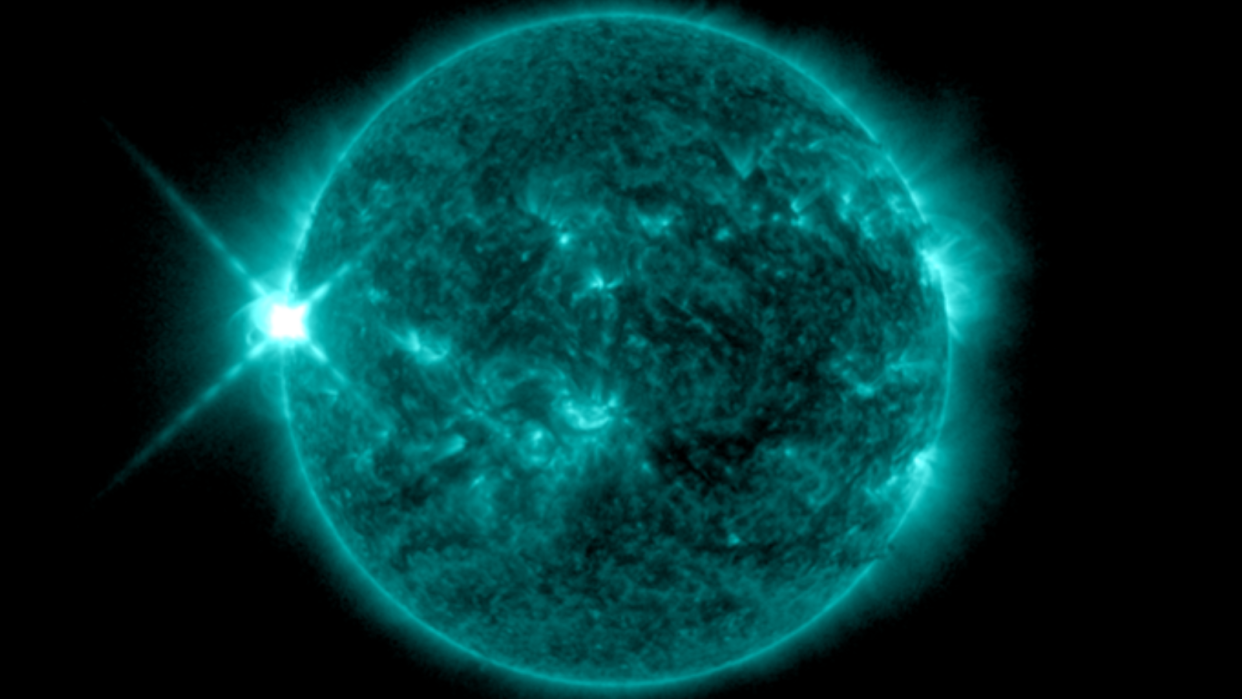  An image of the sun in ultraviolet showing a solar flare that erupted on new Year's Eve and is about to rock Earth. 