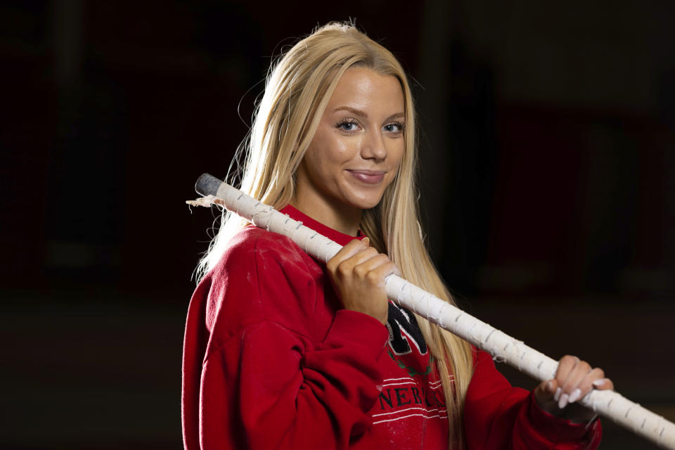 Nebraska NCAA college pole vaulter Jessica Gardner poses Thursday, March 9, 2023, in Lincoln, Neb. Making TikTok videos for fun evolved into a serious moneymaking venture for Nebraska track athlete Jess Gardner, who is among the many social media stars in college sports. (AP Photo/Rebecca S. Gratz)