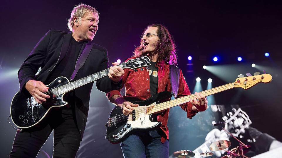 Alex Lifeson (L) and Geddy Lee of Rush perform in concert at The Frank Erwin Center on April 23, 2013 in Austin, Texas.