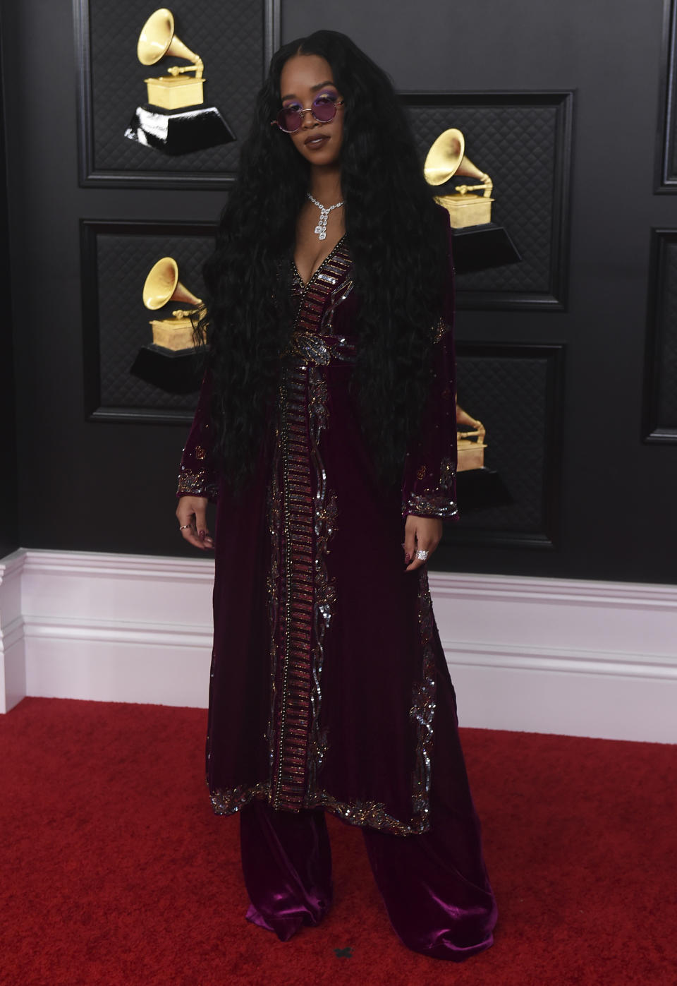 H.E.R. arrives at the 63rd annual Grammy Awards at the Los Angeles Convention Center on Sunday, March 14, 2021. (Photo by Jordan Strauss/Invision/AP)