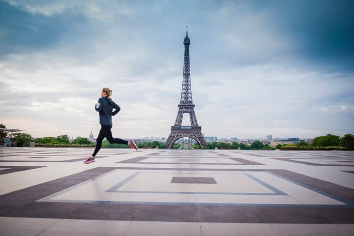 <span class="article__caption">“Caucasian woman running near Eiffel Tower, Paris, France”</span>