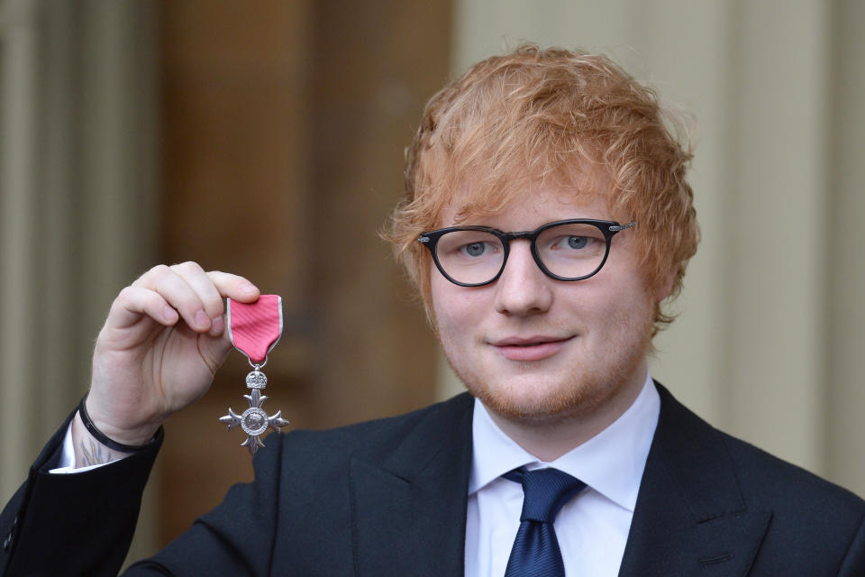 Singer Ed Sheeran with his MBE (PA)