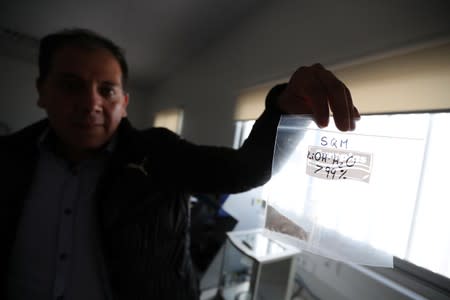 A bag with lithium inside is seen in a laboratory of the University of Antofagasta