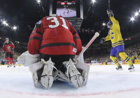 Ice Hockey - 2017 IIHF World Championship - Gold medal game - Canada v Sweden - Cologne, Germany - 21/5/17 - Goalkeeper Calvin Pickard of Canada allows a goal. REUTERS/Andre Ringuette/HHOF-IIHF Images/Pool