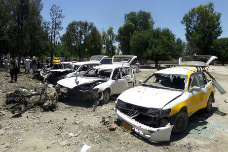 Damaged vehicles are seen after a suicide car bomb attack in Khost province, Afghanistan May 27, 2017. REUTERS/Stringer