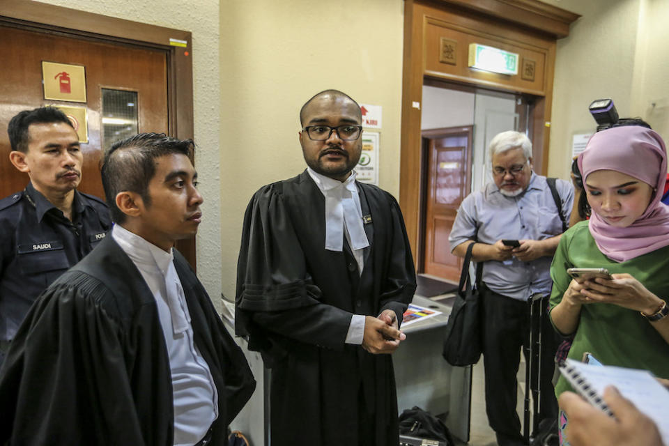 Deputy Public Prosecutor Aaron Chelliah speaks to reporters about the forfeiture action of RM48 million by the government on Tan Sri Larry Low Hock Peng in the High Court in Kuala Lumpur July 19, 2019. — Picture by Firdaus Latif