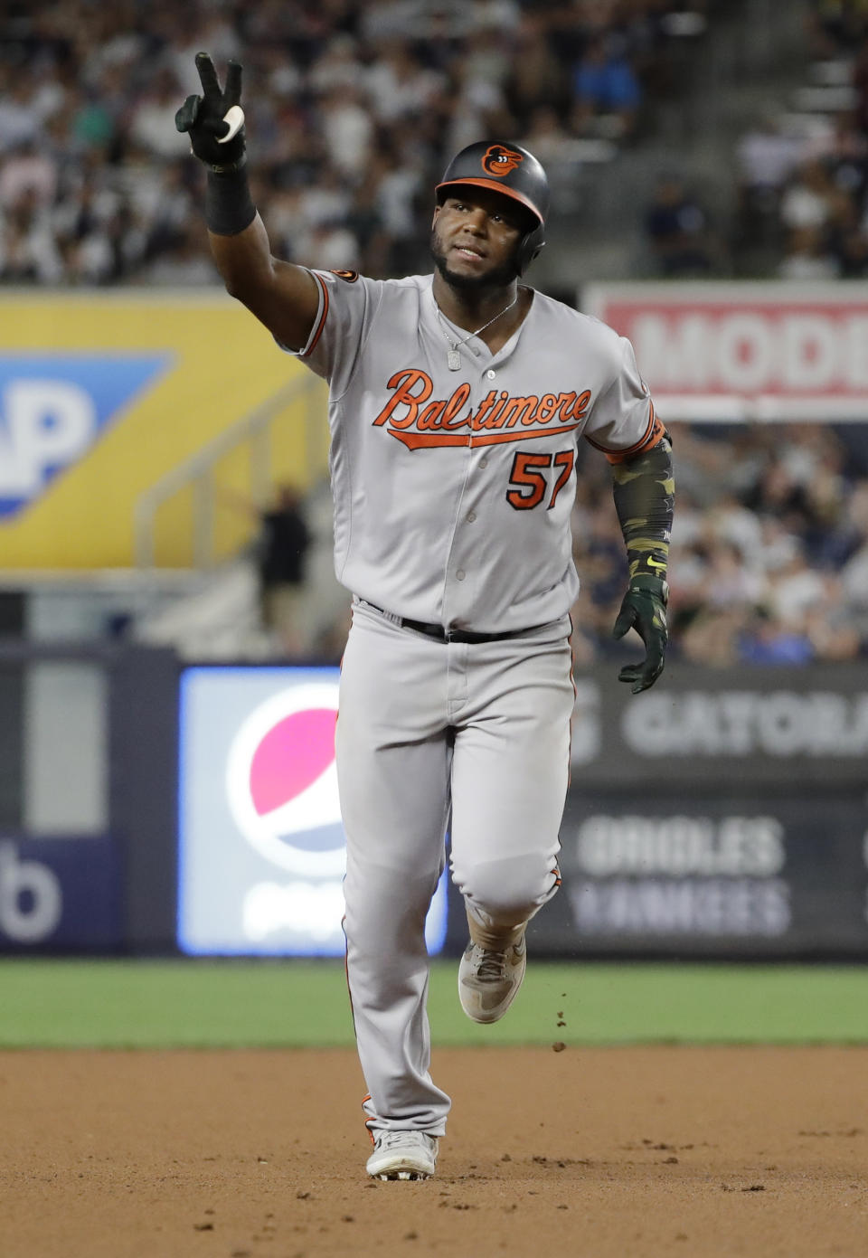 Baltimore Orioles' Hanser Alberto gestures to fans as he runs the bases after hitting a three-run home run during the seventh inning of the second game of a baseball doubleheader against the New York Yankees, Monday, Aug. 12, 2019, in New York. (AP Photo/Frank Franklin II)
