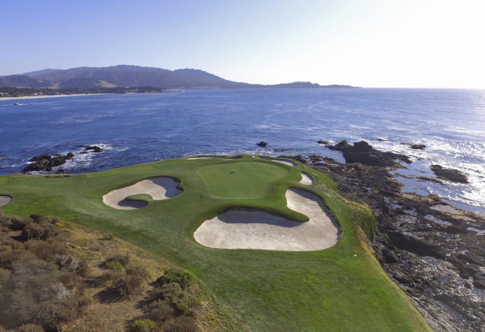 This Nov. 8, 2018 photo shows an aerial view of the seventh green of the Pebble Beach Golf Links in Pebble Beach, Calif. The U.S. Open golf tournament is scheduled at Pebble Beach from June 13-16, 2019. (AP Photo/Terry Chea)