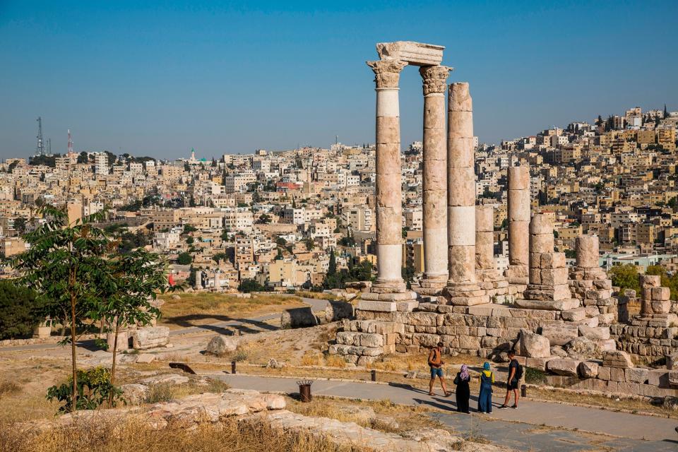 Ruins perched above an ancient city