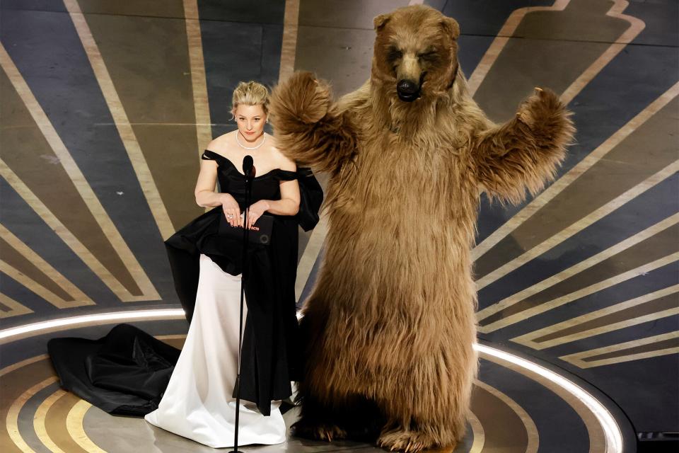 Elizabeth Banks and Cocaine Bear speak onstage during the 95th Annual Academy Awards at Dolby Theatre on March 12, 2023 in Hollywood, California.