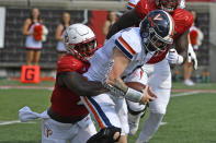 Louisville linebacker Yasir Abdullah (22) tackles Virginia quarterback Brennan Armstrong (5) for a loss during the first half of an NCAA college football game in Louisville, Ky., Saturday, Oct. 9, 2021. (AP Photo/Timothy D. Easley)