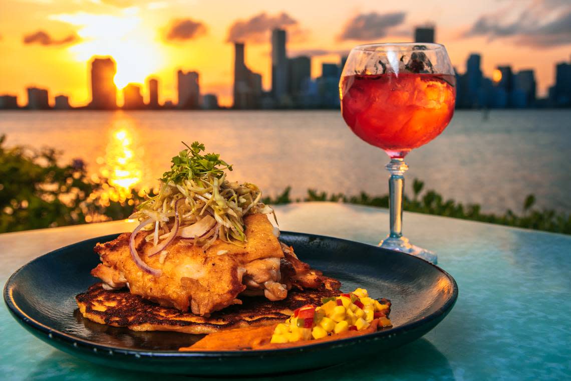 The menu at Rusty Pelican in Key Biscayne is seafood-forward. Two thirds of the entrees involve some sort of seafood, like this crispy snapper, but you can still order steak or vegan favorites.