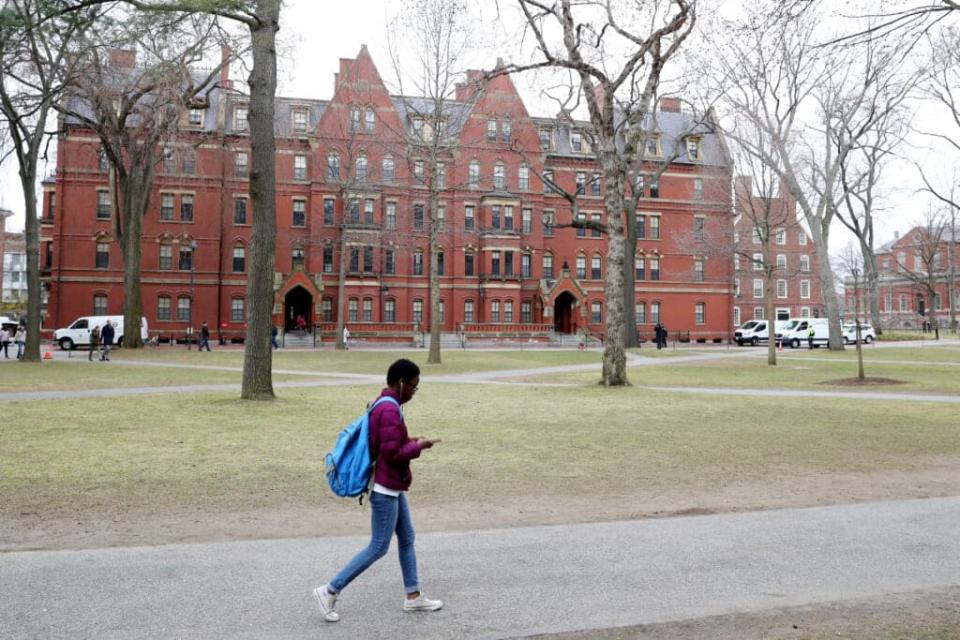 A student walks through Harvard Yard on the campus of Harvard University on March 12, 2020 in Cambridge, Massachusetts. (Photo by Maddie Meyer/Getty Images)