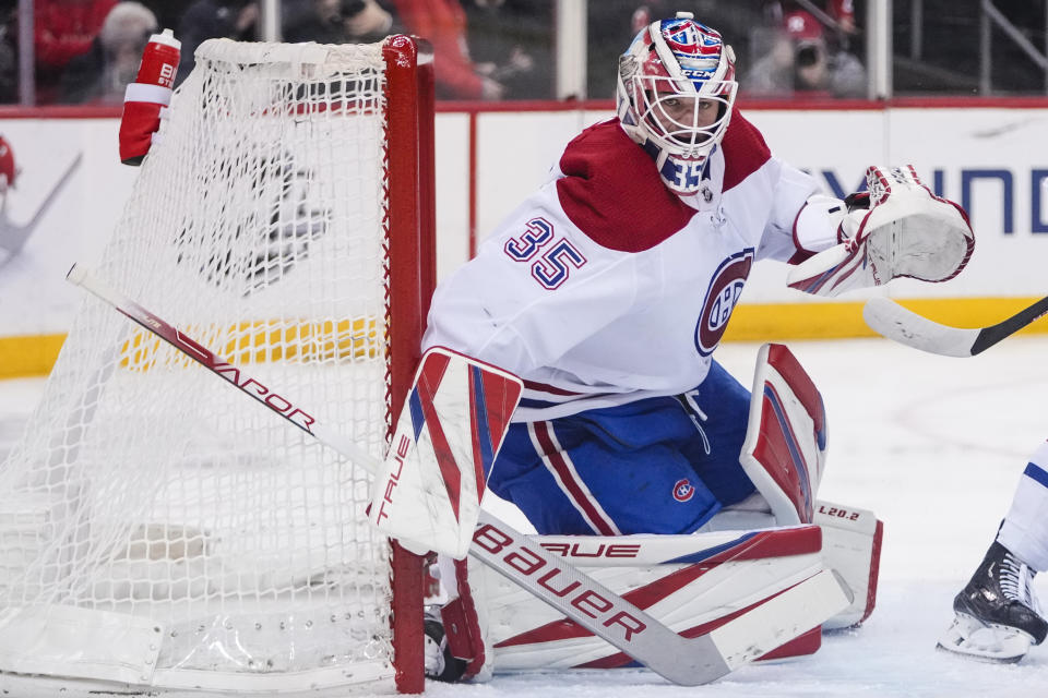 Montreal Canadiens goaltender Sam Montembeault (35) protects his net during the second period of an NHL hockey game against the New Jersey Devils Tuesday, Feb. 21, 2023, in Newark, N.J. (AP Photo/Frank Franklin II)