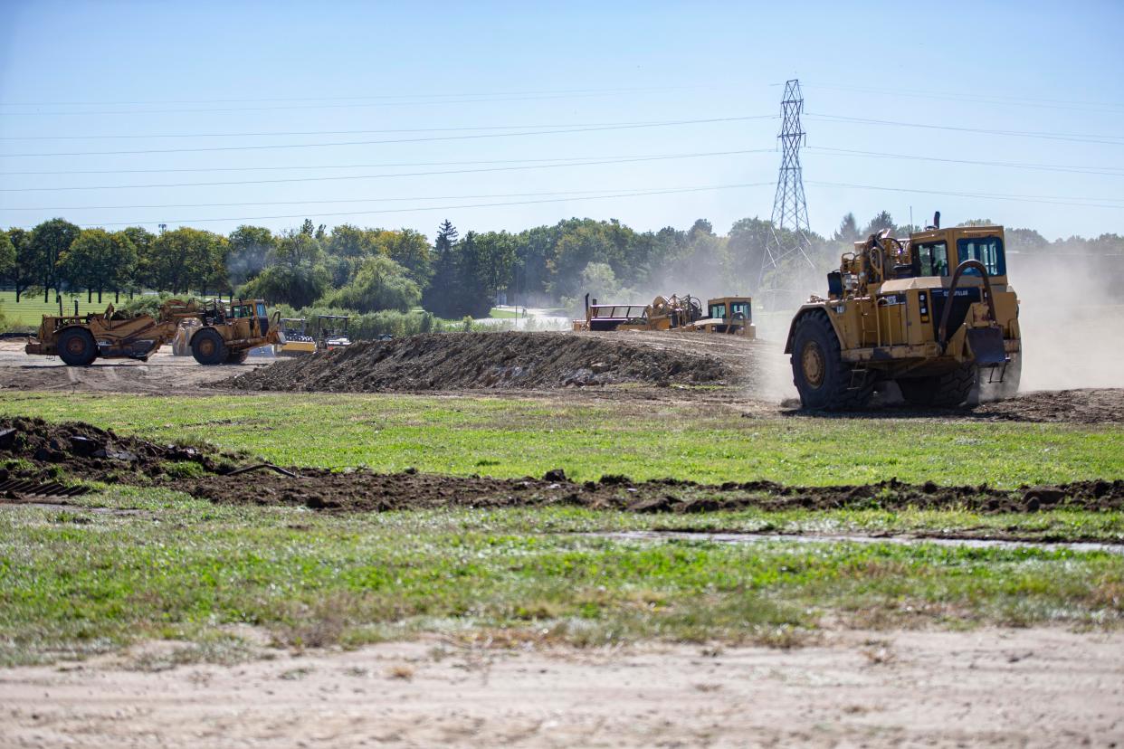 Construction workers begin flattening the surface for the Hard Rock Casino Rockford resort on Wednesday, Sept. 28, 2022, in Rockford.