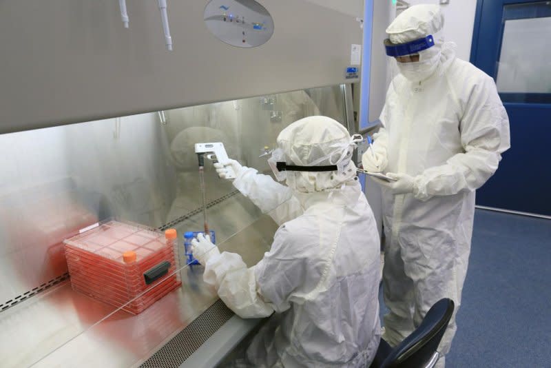 The FDA Friday approved the first human gene editing treatment. It will be used to treat sickle cell disease, a blood disorder most prevalent among Black Americans. Technicians are shown working in a laboratory at Cincinnati Children's, where gene-correction therapies are tested and produced for clinical trials like the one for sickle cell anemia. Photo by Cincinnati Children's Hospital