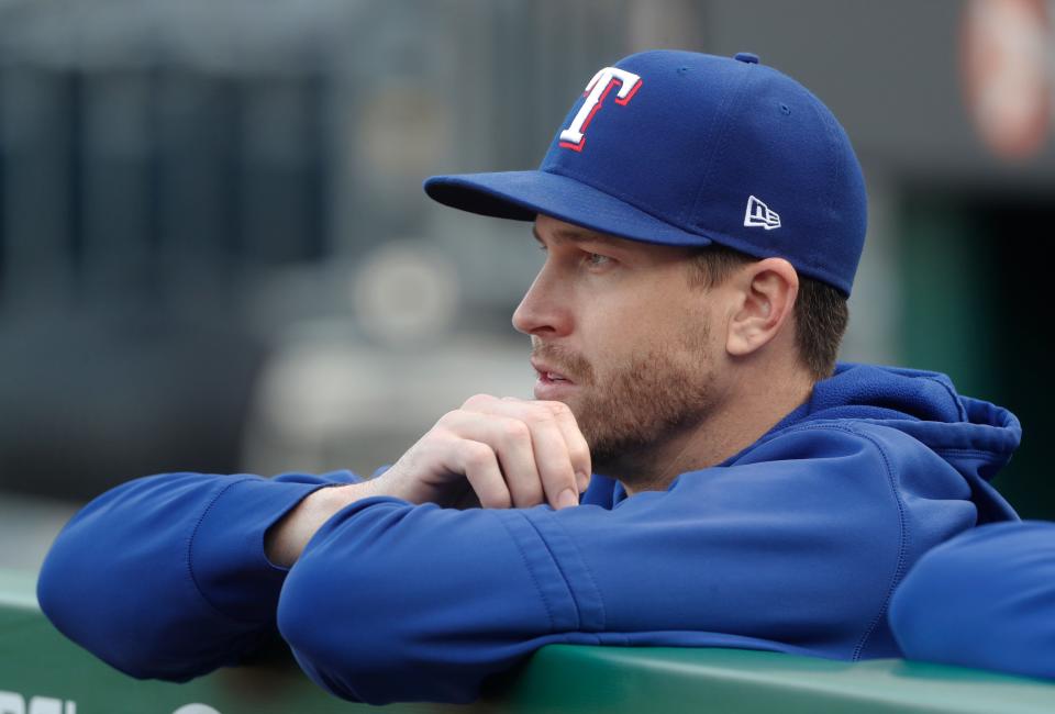 Jacob deGrom looks on from the dugout before the Texas Rangers'  game against the Pittsburgh Pirates at PNC Park on May 23.