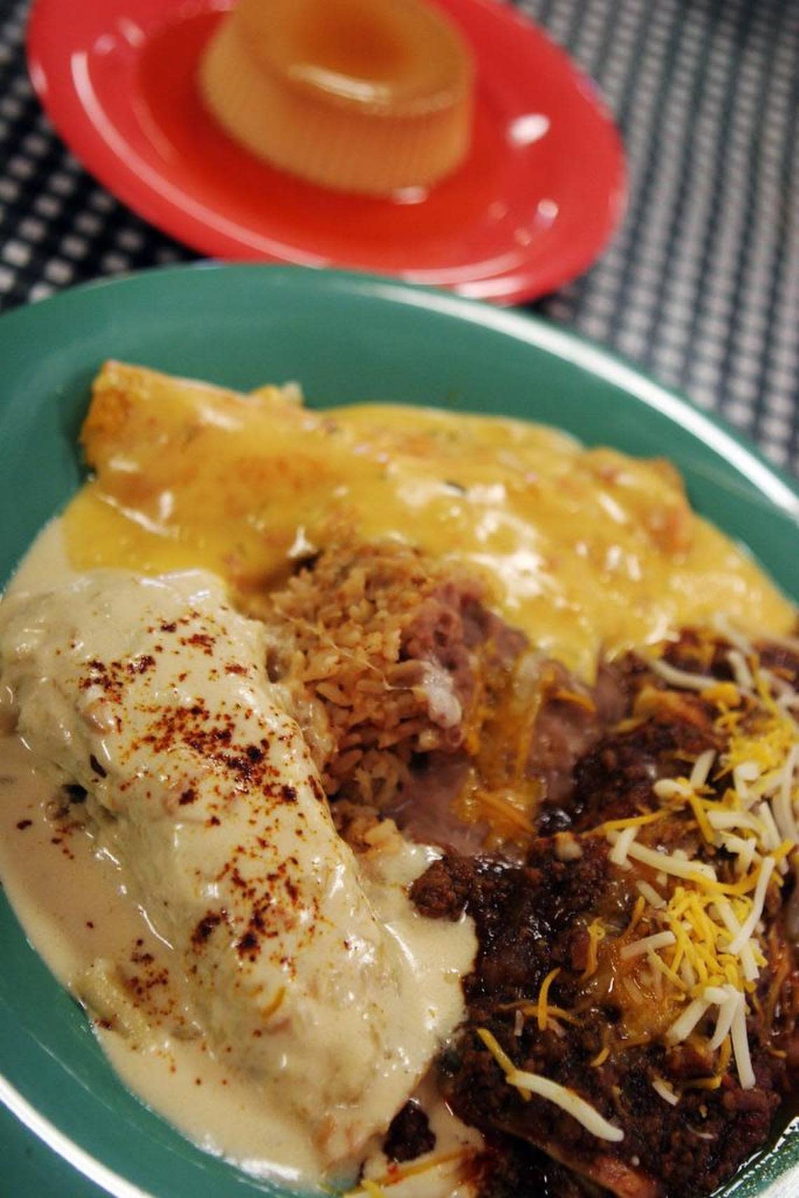A combo enchilada with flan at La Espuela Mexican Cantina at the Fort Worth Stock Show.