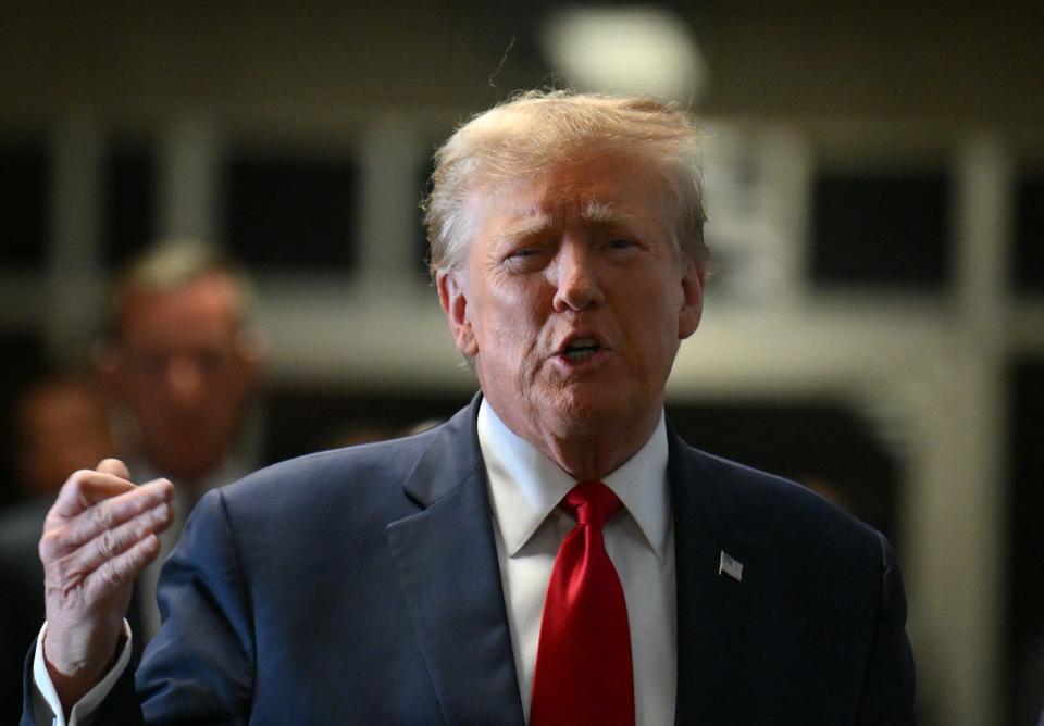 Former President Donald Trump addresses the media outside of a hearing on his felony hush money trial at Manhattan Criminal Court on Feb. 15, 2024.