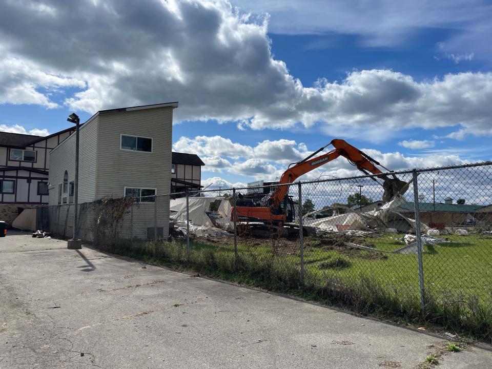 Demolition work begins at the shuttered Barnstormer Banquet Center in Green Oak Township on Monday, Oct. 9, 2023.