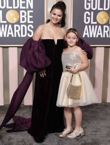 <p>Frazer Harrison/WireImage</p> Selena Gomez and Gracie Elliot Teefey attend the 80th Annual Golden Globe Awards