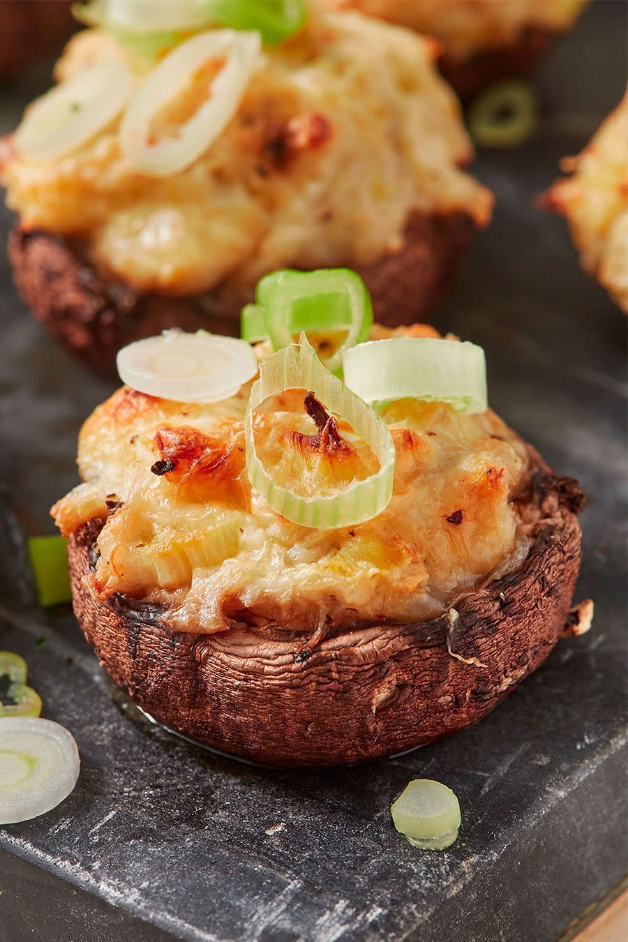 <p>This recipe is irresistible with the addition of sweet, tender crab, fresh spring onions, and rich cream cheese.</p><p>Get the <a href="https://www.delish.com/uk/cooking/recipes/a32978049/crab-artichoke-stuffed-mushrooms-recipe/" rel="nofollow noopener" target="_blank" data-ylk="slk:Crab Artichoke Stuffed Mushrooms;elm:context_link;itc:0;sec:content-canvas" class="link ">Crab Artichoke Stuffed Mushrooms</a> recipe.</p>