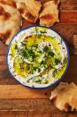 <p>Tzatziki is a simple sauce that goes well on <a href="https://www.delish.com/cooking/recipe-ideas/a26092675/best-chicken-shawarma-recipe/" rel="nofollow noopener" target="_blank" data-ylk="slk:chicken shawarma;elm:context_link;itc:0;sec:content-canvas" class="link ">chicken shawarma</a>, served with <a href="https://www.delish.com/cooking/g1172/cucumber-recipes/" rel="nofollow noopener" target="_blank" data-ylk="slk:cucumbers;elm:context_link;itc:0;sec:content-canvas" class="link ">cucumbers</a> and <a href="https://www.delish.com/cooking/recipe-ideas/a28143766/homemade-pita-bread/" rel="nofollow noopener" target="_blank" data-ylk="slk:pita;elm:context_link;itc:0;sec:content-canvas" class="link ">pita</a>, and just about everything else you want it on. It's the condiment we always keep in our fridge—just in case.</p><p>Get the <strong><a href="https://www.delish.com/cooking/recipe-ideas/a30715622/authentic-tzatziki-recipe/" rel="nofollow noopener" target="_blank" data-ylk="slk:Authentic Tzatziki recipe;elm:context_link;itc:0;sec:content-canvas" class="link ">Authentic Tzatziki recipe</a></strong>.</p>
