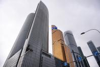 Workers clean a part of a damaged skyscraper in the "Moscow City" business district after a reported drone attack in Moscow, Russia, Wednesday, Aug. 23, 2023. Russia's defense ministry and Moscow's mayor said Ukrainian drones were downed in Moscow and the region around the capital early Wednesday. No casualties were reported. (AP Photo)