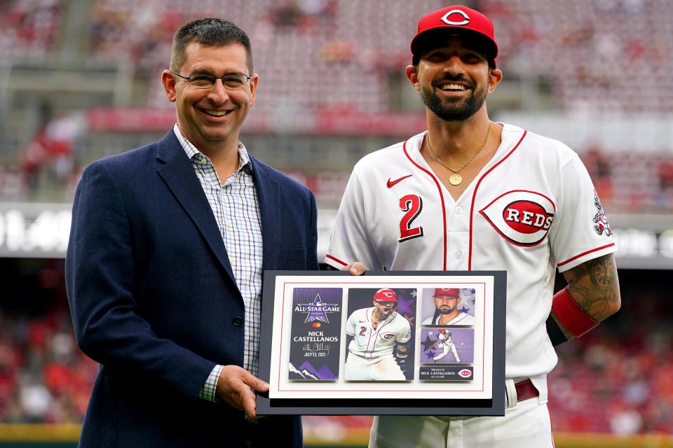 The Cincinnati Reds lost right fielder Nick Castellanos (2), presented with an All-Star plaque in July 21, to free agency in the off-season.