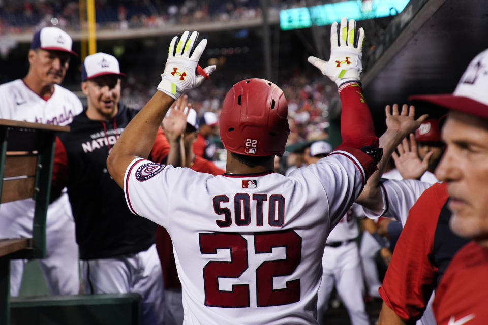 Washington Nationals' Juan Soto celebrates after his solo home run during the fourth inning of a baseball game against the New York Mets at Nationals Park, Monday, Aug. 1, 2022, in Washington. (AP Photo/Alex Brandon)