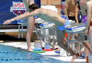 Michael Phelps practices on Wednesday, April 23, 2014, in Mesa, Ariz. Phelps is competing in the Arena Grand Prix at Mesa on Thursday after a nearly two-year retirement. (AP Photo/Matt York)