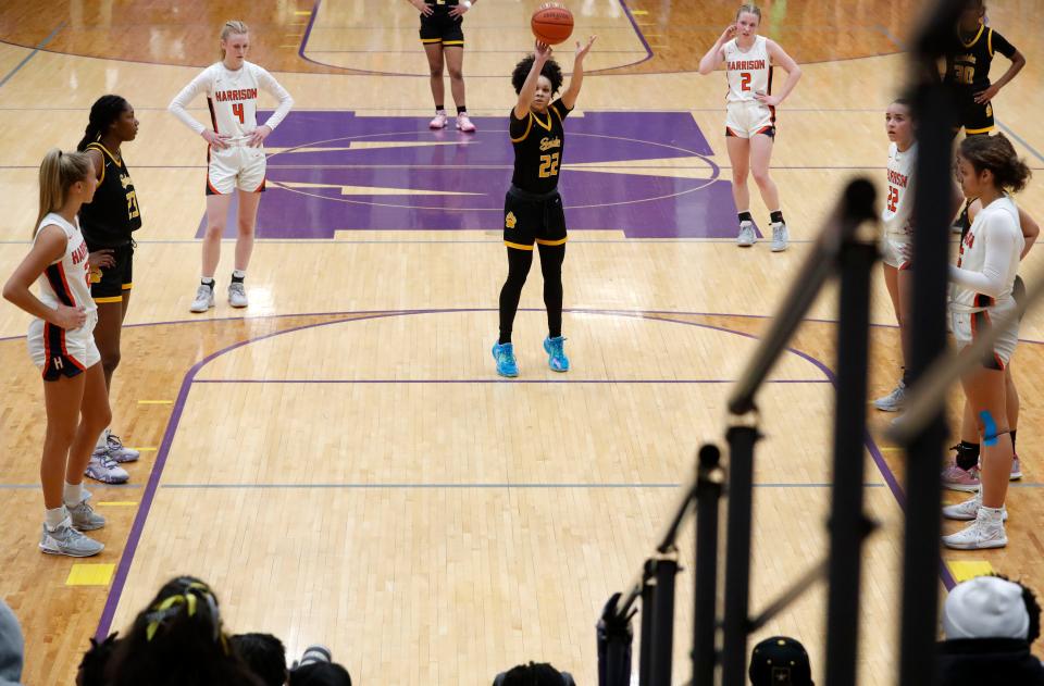 Fort Wayne Snider Panthers guard Jordyn Poole (22) shoot a free throw during the IHSAA girl’s basketball regional championship game against the Harrison Raiders, Saturday, Feb. 11, 2023, at Marion High School’s Bill Green Arena in Marion, Ind. Fort Wayne Snider Panthers won 67-55.