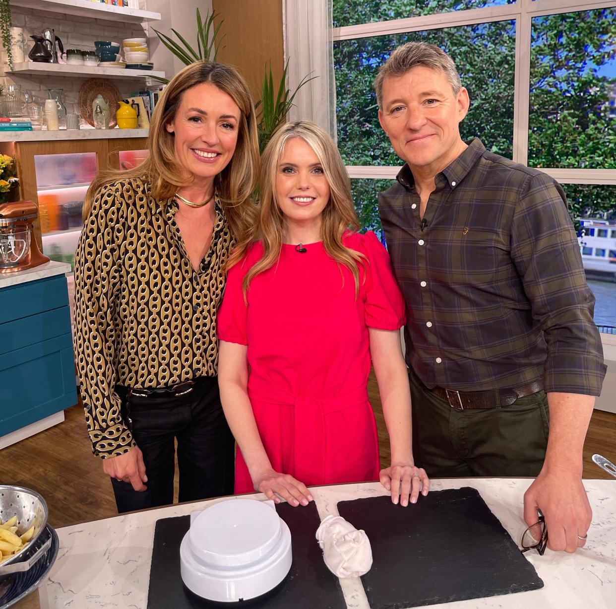 Claire Sisk with Ben Shephard and Cat Deeley behind the cooking station at This Morning. (Supplied)