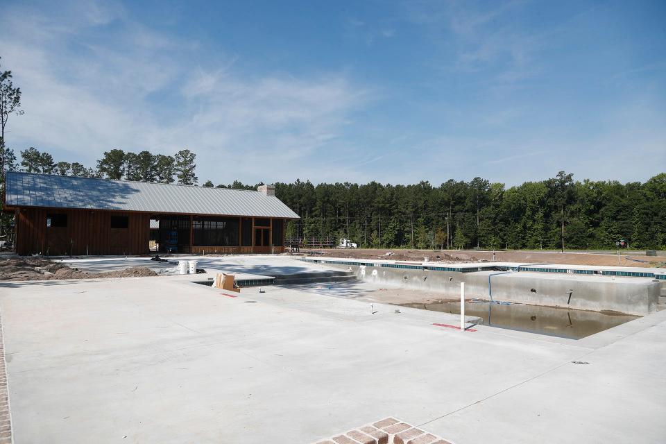 The swimming pool and clubhouse are under construction for one of the new Heartwood at Richmond Hill neighborhoods.
