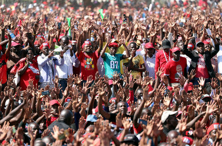 Supporters of Nelson Chamisa's opposition Movement for Democratic Change (MDC) attend the final election rally in Harare, Zimbabwe, July 28, 2018. REUTERS/Mike Hutchings